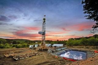 A hydraulic-fracture natural gas well taps into the Antrim Shale formation in northern Michigan’s Benzie County in 2010. (Photo credit: Heather Rousseau / Circle of Blue)