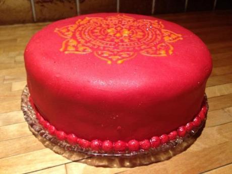 red fondant iced bollywood nights treacle ginger and mango cake stencilled decoration