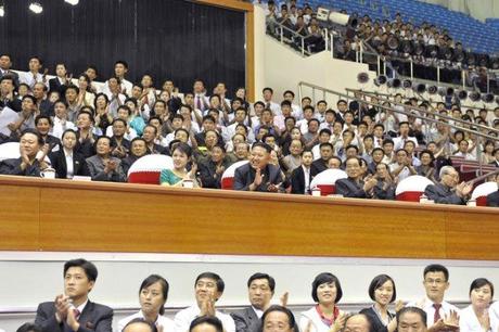 Kim Jong Un (3rd L) watches senior women's competitions during the 2013 Asian Cup and Interclub Junior and Senior Weightlifting Championships in Pyongyang on 15 September 2013 (Photo: Rodong Sinmun) Also in attendance are his wife Ri Sol Ju (2nd L), VMar Choe Ryong Hae (L), Pak Pong Ju (4th L) and Kim Ki Nam (5th L) (Photo: Rodong Sinmun). 