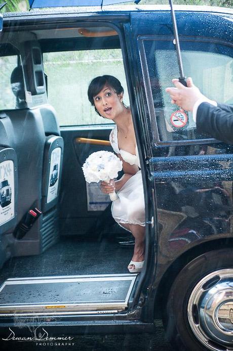 Bride Looks out Black London Cab at BlackHeath