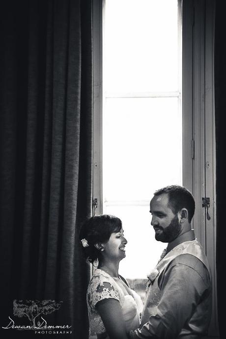 Bride and Groom by window