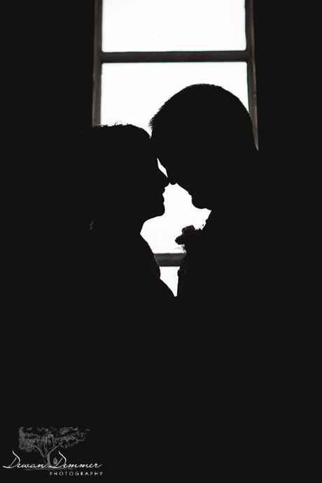 Bride and Groom silhoutte by window