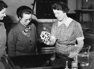 Dorothy Wrinch holding a model of a cylcol, 1938. (Associated Press photograph)