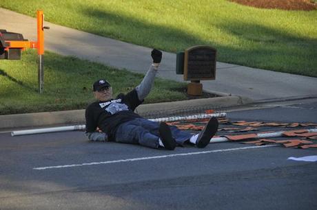 Dick Ochs Blocks the Road