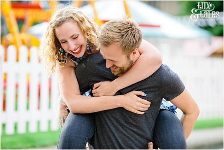 Fun portrait of couple giving piggy back ride in Sheffield Yorkshire