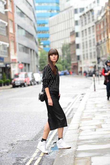 outfit leather pencil skirt pinstripe sweater sports luxe