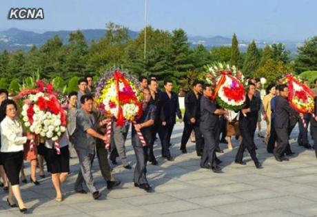 Floral wreaths delivered to the memorial bust of Kim Jong Suk to mark the 64th anniversary of her death in Pyongyang on 22 September 2013 (Photo: KCNA).