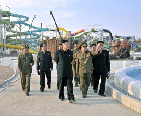 Kim Jong Un tours the construction of the Munsu Swimming Complex in Pyongyang.  Also seen in attendance is his uncle, NDC Vice Chairman Jang Song Taek (2nd L) (Photo: Rodong Sinmun).