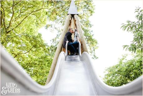 Play park Stockeld engagement shoot kissing couple afternoon light posing 