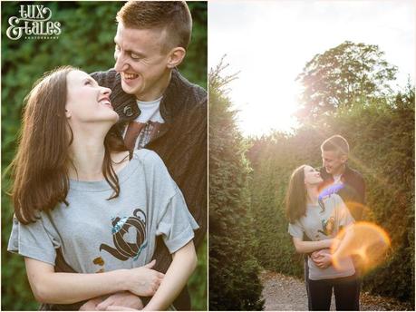 Couple embrace in Maze at stockeld park 