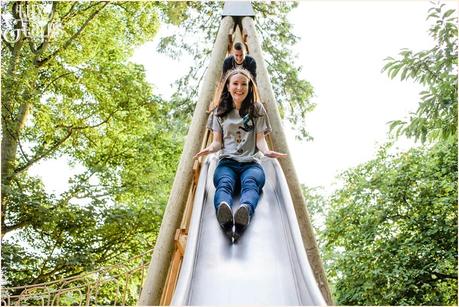 Girl slides down slide at stockeld park 