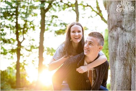 Piggy back ride at Stockeld park in low afternoon sun 