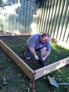 Hubby building the twins a sandpit