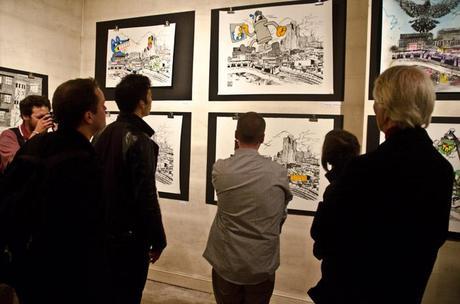 John Dolan looking at collaborations John Dolan exhibition photos