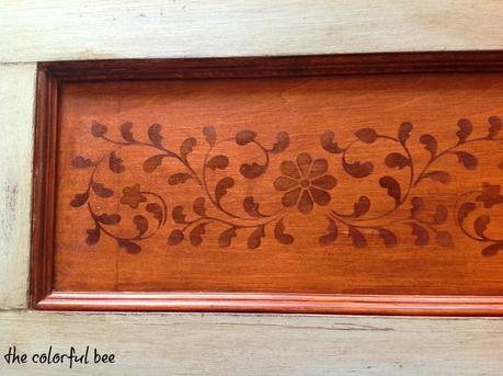 a stained, painted and antiqued wood valance