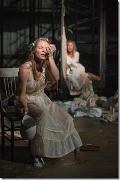 Rosa (Chaon Cross) cools herself with a wet cloth in Steppenwolf Theatre Company’s American-premiere production of The Wheel by Zinnie Harris, directed by ensemble member Tina Landau.  (photo credit: Michael Brosilow)