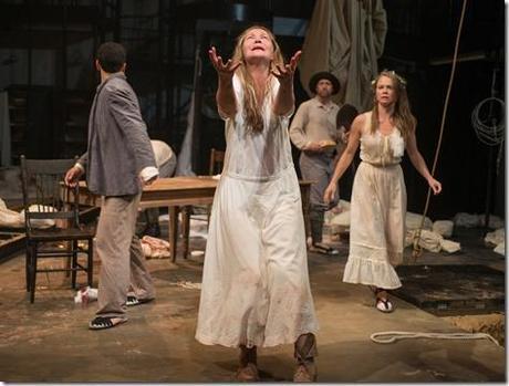 Beatriz (ensemble member Joan Allen, center) pleads for the action to stop moving forward as (left to right) Tomas (Demetrios Troy), Colline (ensemble member Tim Hopper) and Rosa (Chaon Cross) look on in Steppenwolf Theatre Company’s American-premiere production of The Wheel by Zinnie Harris, directed by ensemble member Tina Landau.  (photo credit: Michael Brosilow)