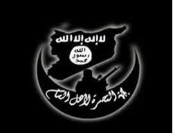 The insignia of the Al-Nusra Front (whose full name is the Front for Assistance to the Residents of Greater Syria). It shows the map of Syria, the Islamic crescent and the silhouette of a jihad fighter 