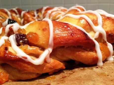 freshly baked golden brown apricot couronne crown with white icing great bloggers bake off british