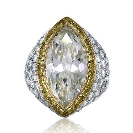 Platinum and 18k Yellow Gold 7.22 Carat Marquise Cut Pave Set Ring