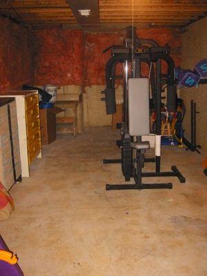 An unfinished basement used for storage and ex...
