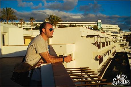 Matt looks out at sunset on blacony at Sandos Papagayo hotel in Lanzarote