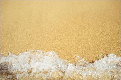 Water returns to ocean in Playa Blanca Lanzarote