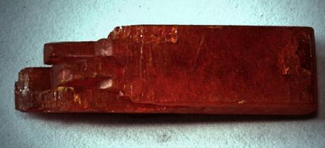 A sample of potassium dichromate, also known as the mineral lopezite. About 10 mm long, probably synthetically grown. (Credit: A13ean, http://commons.wikimedia.org/wiki/User:A13ean)