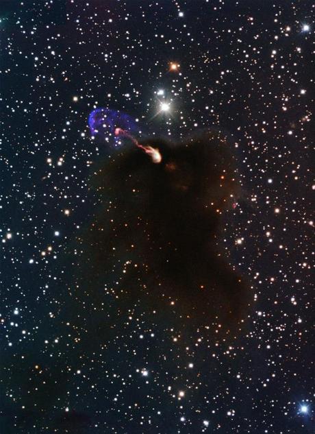 This image from ESO's New Technology Telescope at the La Silla Observatory in Chile shows the Herbig-Haro object HH 46/47 as jets emerging from a star-forming dark cloud.  Credit: ESO/Bo Reipurth