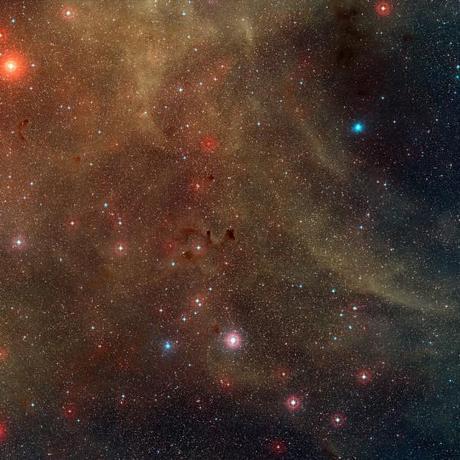 This wide-field view shows a rich region of dust clouds and star formation in the southern constellation of Vela. Close to the center of the picture the jets of the Herbig-Haro object HH 46/47 can be seen emerging from a dark cloud in which infant stars are being born. Credit:  ESO/Digitized Sky Survey 2. Acknowledgement: Davide De Martin