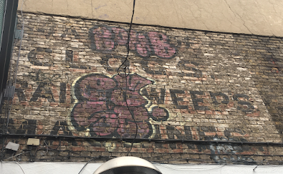 Two ghostsigns clinging on to what's left of Holywell Lane, Shoreditch, EC2