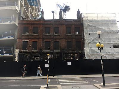 Two ghostsigns clinging on to what's left of Holywell Lane, Shoreditch, EC2