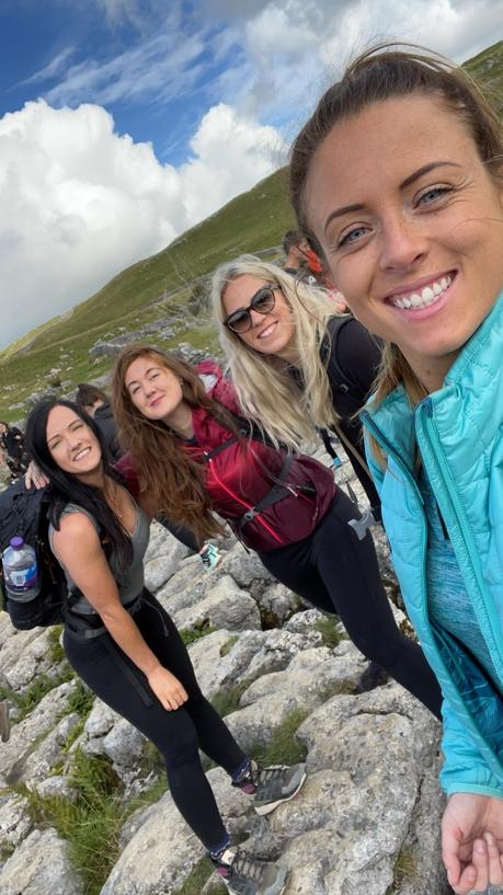 A group hiking meeting up in the Yorkshire Dales using the Hiiker app A picture containing person, outdoor, posing, people
Description automatically generated