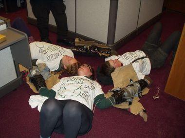 Environmental protestors in June 2012 locked themselves together and refused to leave the offices of Secretary of State Kate Brown and Treasurer Ted Wheeler in the Oregon State Capitol. State police arrested six protestors. (Oregon State Police)