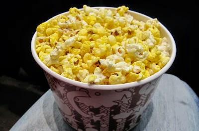 Eating Popcorn In The Cinema Makes people Immune To Advertising