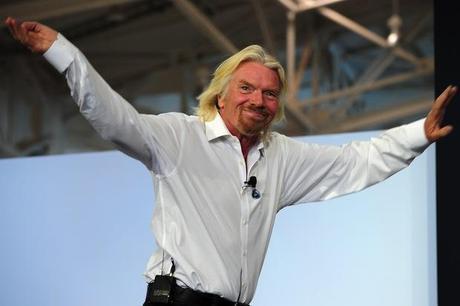 Sir Richard Branson flaps his wings ready to fly away. Image: Getty