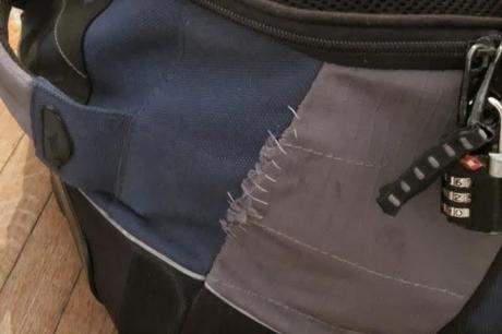 Fixing a Stuck Handle in Backpack - A Broken Luggage - Paperblog