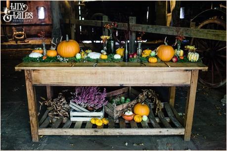 Autumn themed wedding table with pumpkins and miss