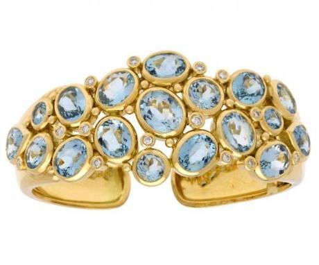 18 karat bubble cuff in faceted aquamarine