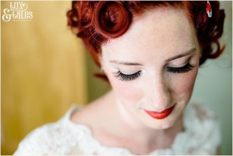 Red headed tattooed bride in portrait with pretty freckles