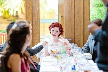 Bride is offered a tissue at a DIY London Tattoo wedding 