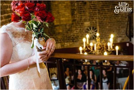 Bride thows bouquet over balcony at London wedding 