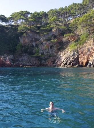 braving the chilly Mediterranean waters in September in a secluded cove