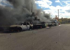 Four RCMP vehicles burned in New Brunswick on Oct 17, 2013.