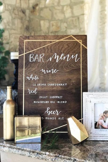 popular wedding signs bar menu on a wooden surface jbg designs via instagram