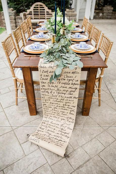 summer wedding trends outdoor reception table with calligraphy signs table runner cora jane photo co