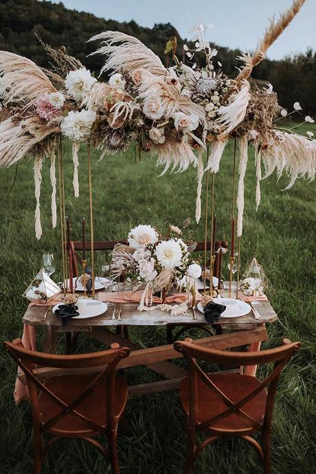 summer wedding trends outdoor bohemian wedding table in rust shades with pampas grass 602 Photography