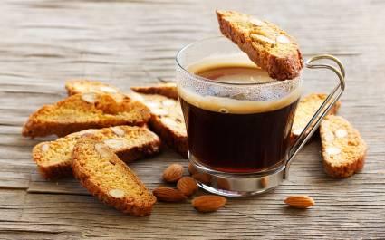 Enchanting Travels Italy Tours Italian biscotti cookies with a cup of coffee