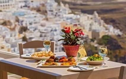 Romantic dinner with views of the mountains, Greece, Santorini