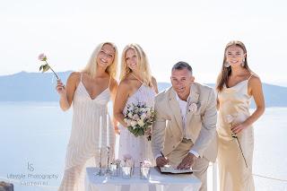 Sweet renewal of vows in Santorini
